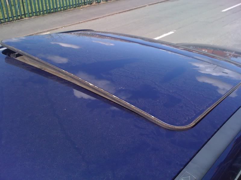 ClubCalibra Sunroof jammed half open help!